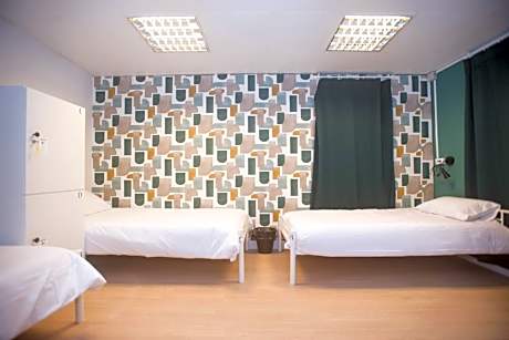 Single Bed in Female Dormitory Room