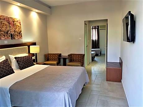 1 Queen 3 Single Non-Smoking Family Room Two Bedrooms Garden View Mini Fridge Wi-Fi Full Breakfast