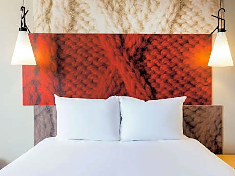 A large double bed, WIFI, flat-screen TV and bathroom with shower