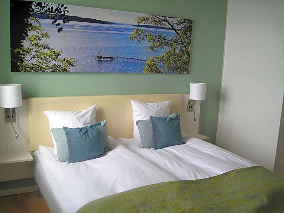 Sixtus Sinatur Hotel & Konference