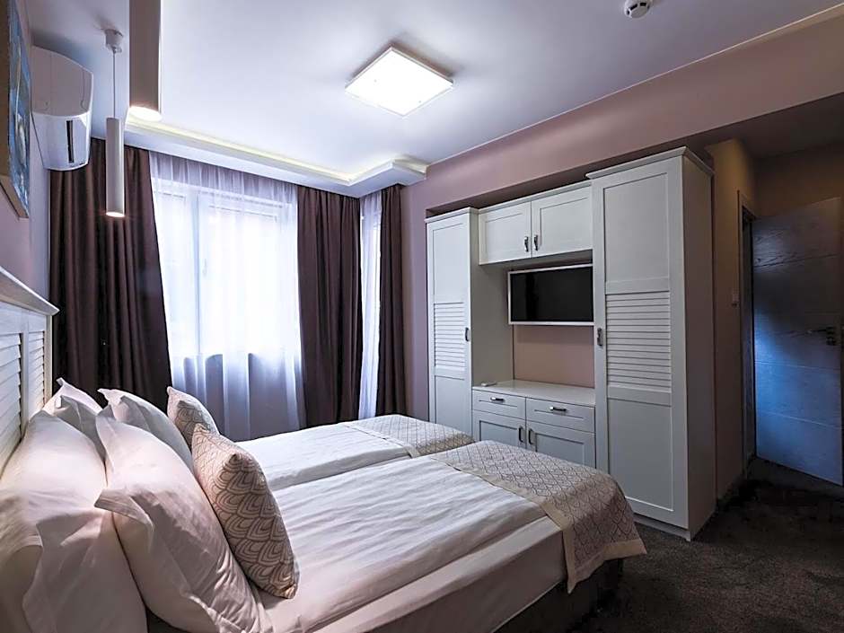 Caro Apartments & Rooms