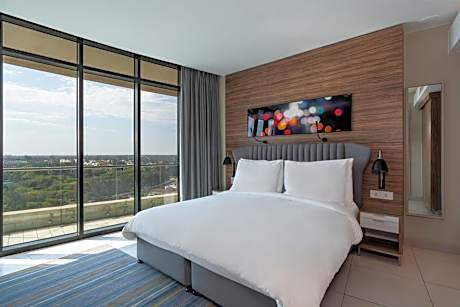 One-Bedroom Apartment with Balcony and City View