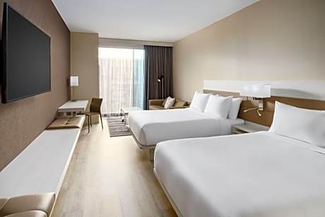 Queen Room with Two Queen Beds and Sofa Bed - City View - High Floor