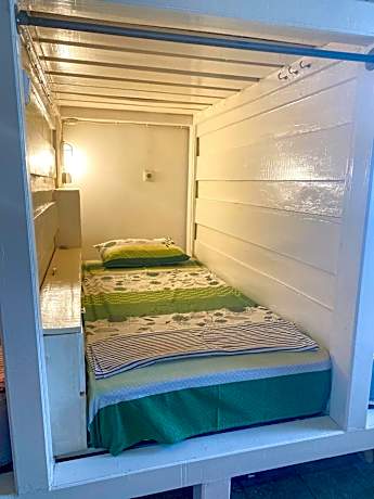 Single Bed in Dormitory Room