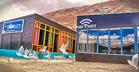 snow land wooden cottage