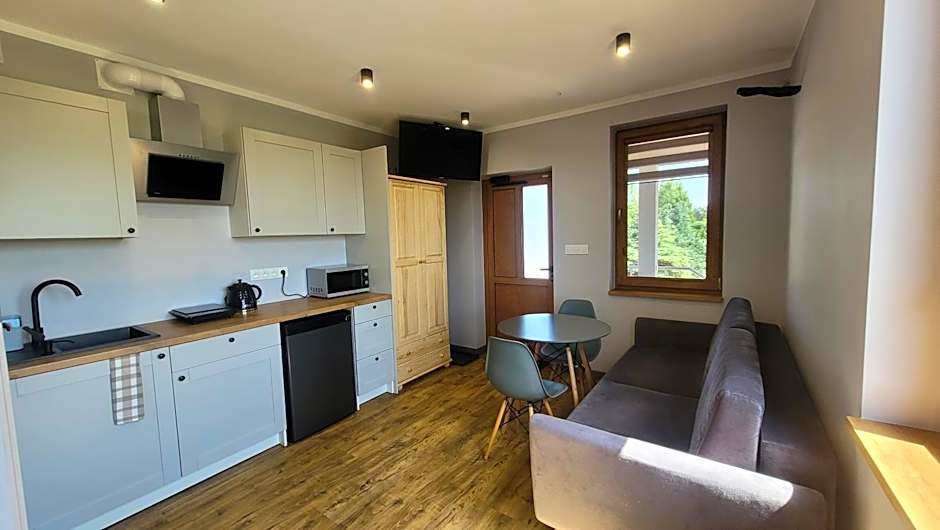 Wrzosowe Wzgórze 5 - Studia i Apartamenty