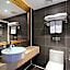 Vienna Hotel Guangzhou Shaheding Metro Station
