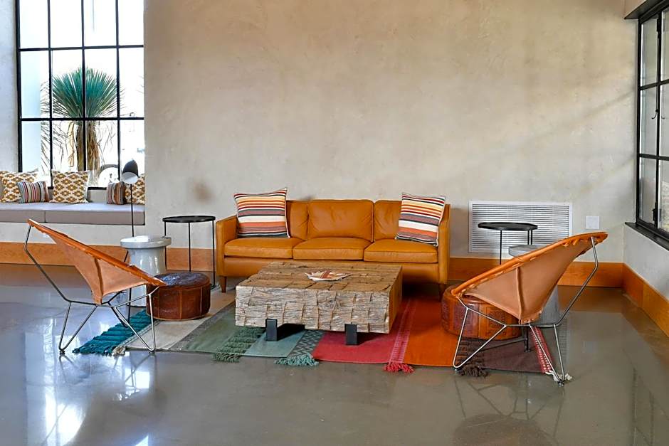 Texican Court, by Valencia Hotel Group