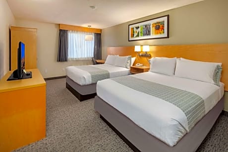 Queen Suite with Two Queen Beds and Sofa Bed - Kitchenette