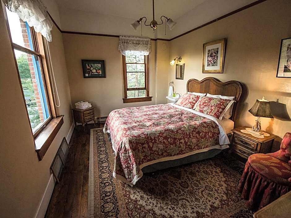 Photo 1 of 4 of Queen Room with Shared Bathroom