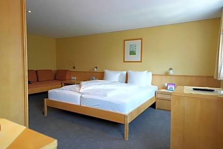 Basic Quadruple Room (2 Adults + 2 Children)