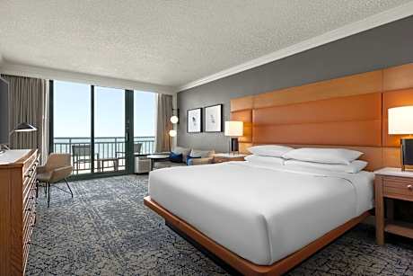 1 Bedroom Suite, 1 King, Sofa bed, Pool view, Partial ocean view, Balcony