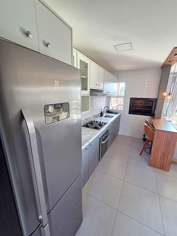 Casa no segundo andar na Praia da Cal com ar e sacada