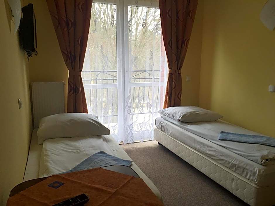 Okulski Grand Rozewie Pokoje i Apartamenty