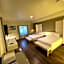 ASPIRE INN & SUITES Orange