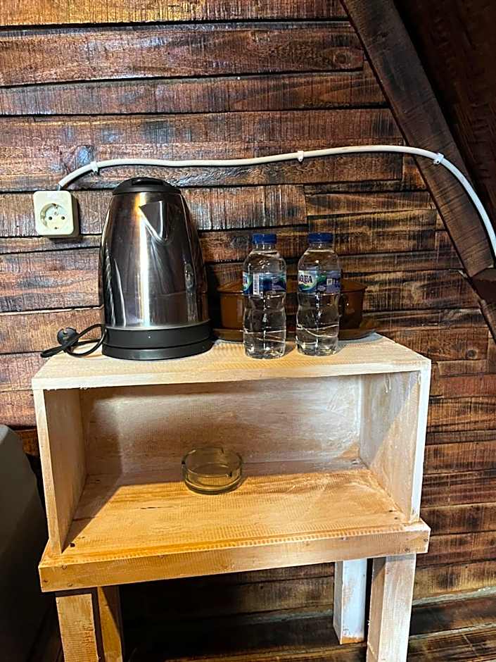 Triangular house and hot spring