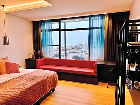 Large twin room with side sea view