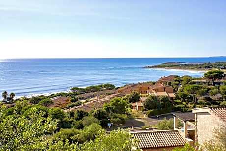Village in Porto Corallo just 200 meters from the beach, apartments with private outdoor area