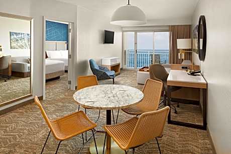 One-Bedroom Queen Suite with Two Queen Beds, Balcony and Trundle Sofa