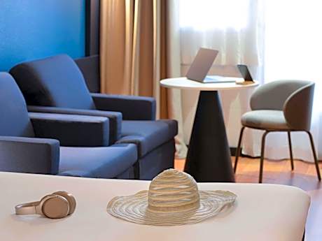 Classic Family Room with one queen bed and two sofa beds.