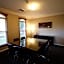 Carlyle Suites & Apartments