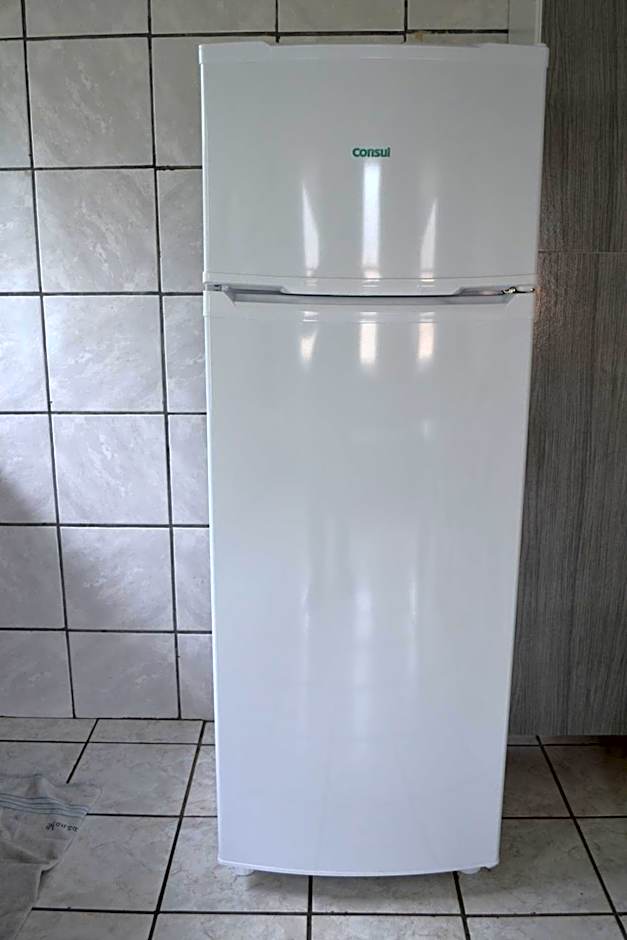 Casas em Condomínio próximo da praia com 2 dormitórios, churrasqueira e 3 vagas de garagem