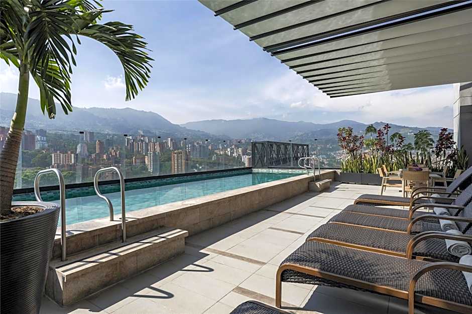 York Medellin, Curio Collection by Hilton