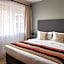 Escala Hotel & Suites