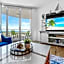 Sunrise Surprise 9th floor 2BR 2 BA King Suite Beach shuttle, heated pool!