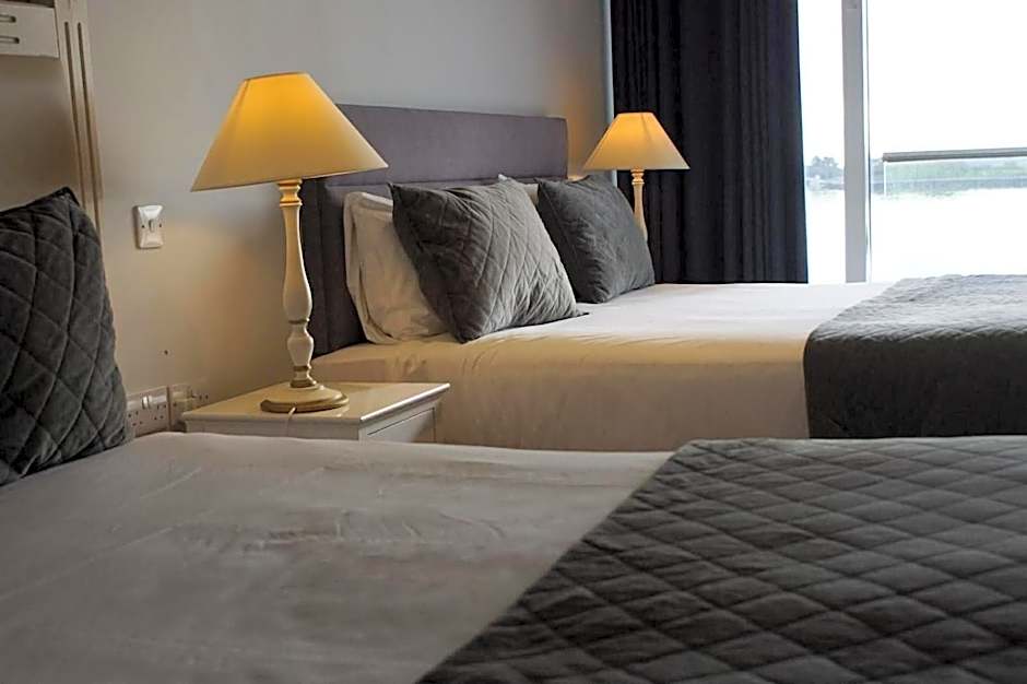 Photo 1 of 2 of Triple Room