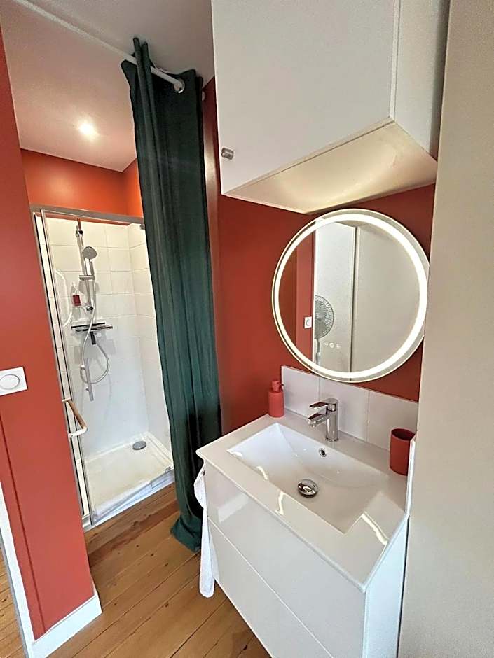 Chambres au coeur du quartier historique - Maison Alternativi