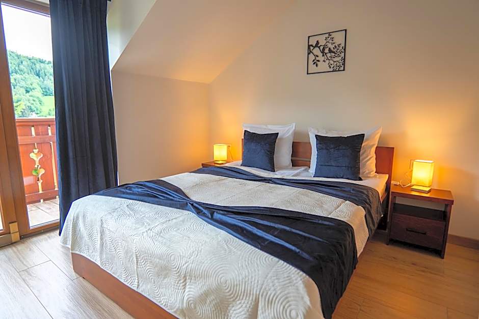 Willa i Wzgórze Jerrego Apartamenty i pokoje z widokiem na góry