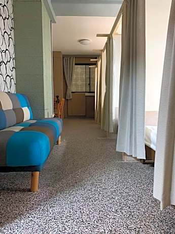 Single Bed in Male Dormitory Room