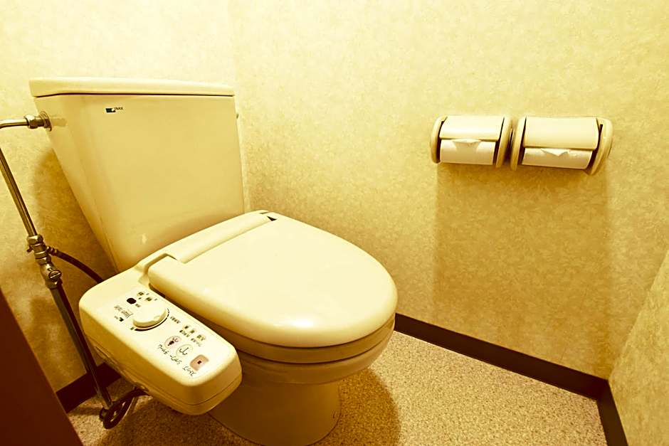 Photo 1 of 5 of Economy Triple Room with Shared Bathroom