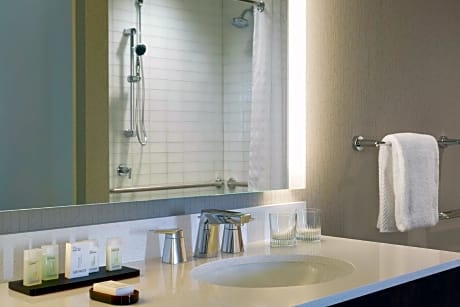 1 King 2 Room Suite Hearing Accessible Roll-In Shower