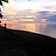 RedDoorz @ July's Haven Seaside Pension Camiguin