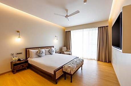 Two-Bedroom Suite with Balcony and Sunrise View