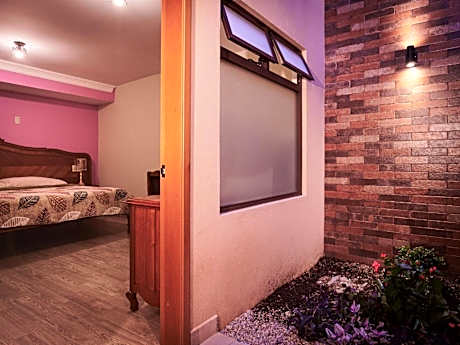 Queen Room with Shared Bathroom