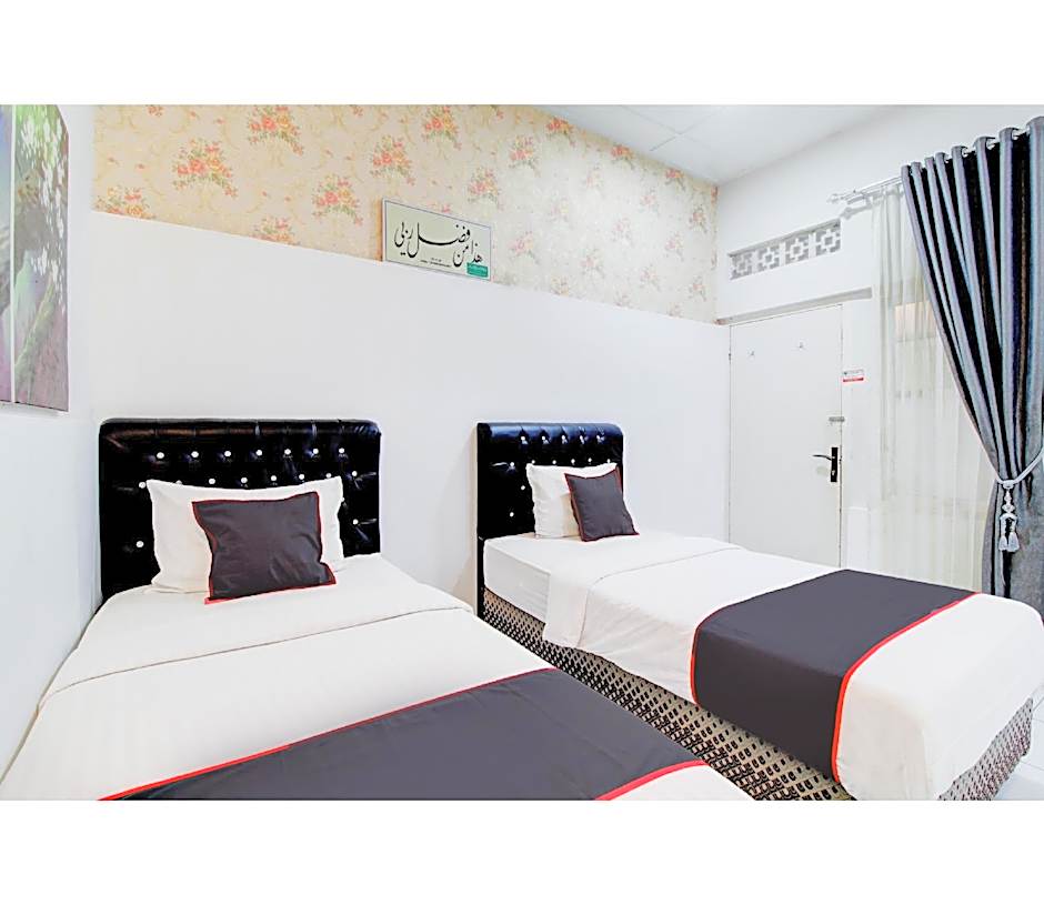 OYO 433 Nelvi Guest House Syariah