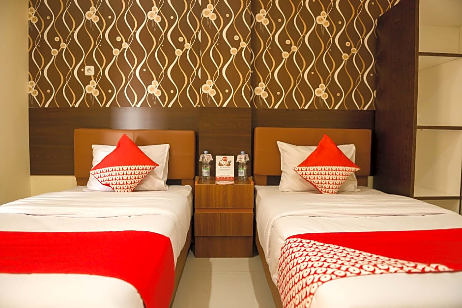 Vaccinated Staff - OYO 149 Alpha Kostel Syariah