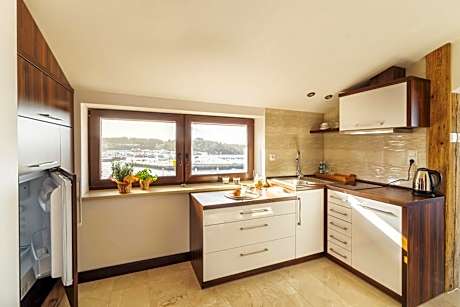 One-Bedroom Apartment with Balcony and Sea View