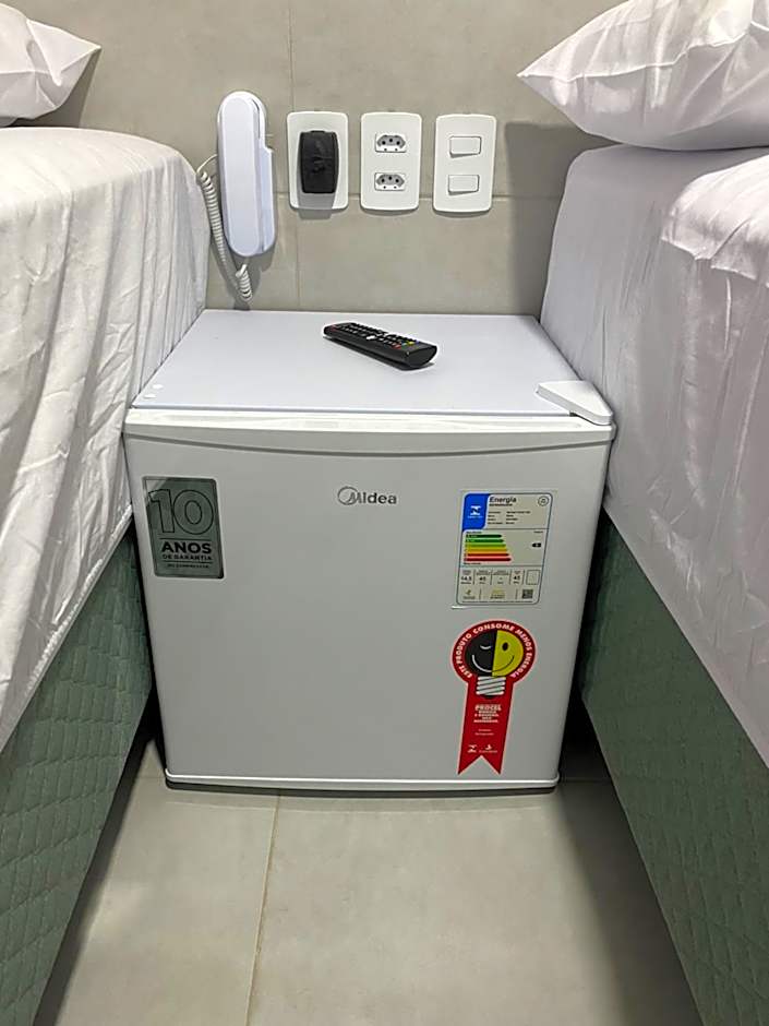 Suíte com banheiro privativo em Pousada recém construída,a 500mts do pátio do forró