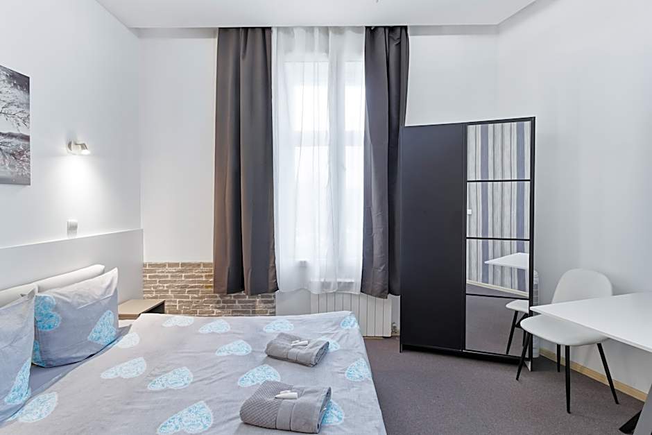 Queen Apartments