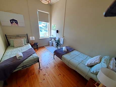 Basic Twin Room - Shared Bathrooms