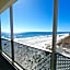 ON THE BEACH! COUPLES GETAWAY,HONEYMOON SWEET, Perfectly Cozy Beach Front Condo, full kitchen, pool, free parking,CHECK-IN AT DOOR
