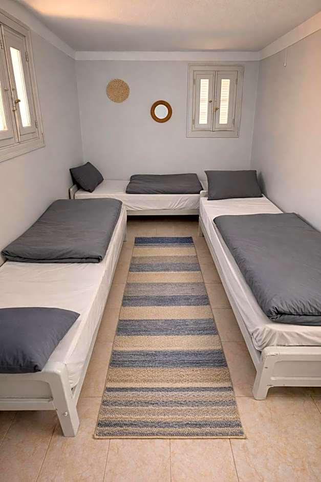 Photo 1 of 7 of Triple Room with Shared Bathroom