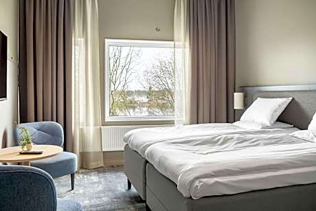 Family Room with Two Single Beds and One Bunk Bed  - View over Klarälven