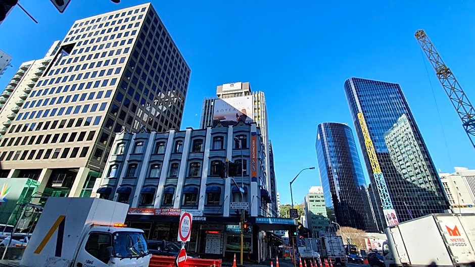 Surf 'N' Snow Backpackers Across Sky Tower