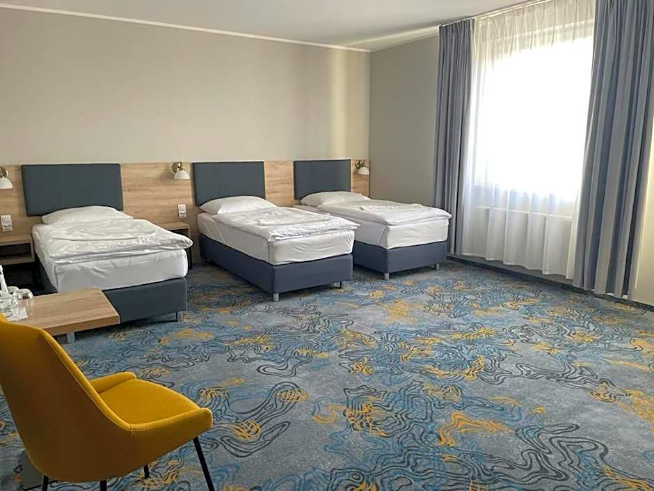 Photo 1 of 5 of Triple Room