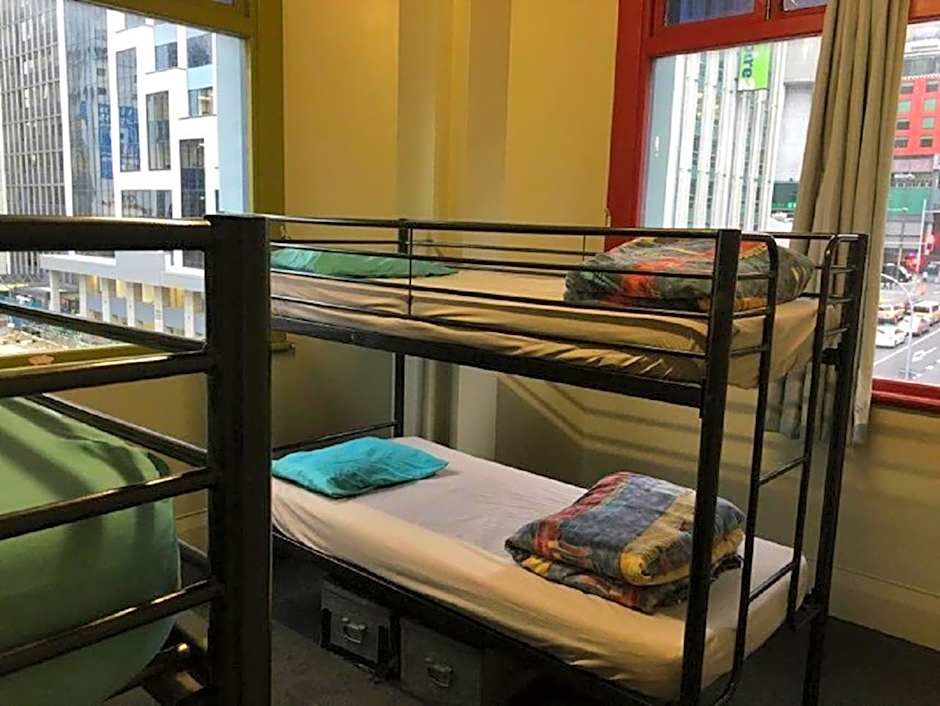 Surf 'N' Snow Backpackers Across Sky Tower